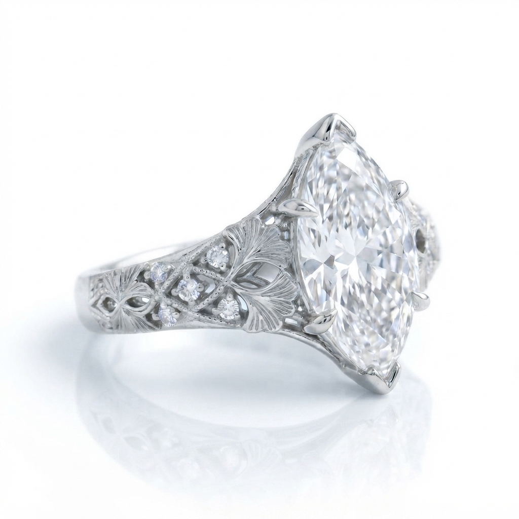 Side perspective view of a white gold 4 carat marquise lab diamond ring with carved leaf motifs.