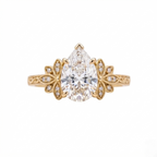 Front view of a 3 carat pear cut lab diamond ring set in yellow gold with milgrain botanical side frames.