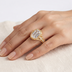 On-hand shot of a 5 CT emerald cut lab grown diamond vintage filigree engagement ring crafted in yellow gold.