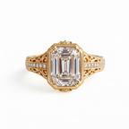 Front view of a 5 CT emerald cut lab grown diamond ring framed in vintage yellow gold filigree.