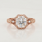 Front top view of a 3 CT cushion cut lab diamond engagement ring in rose gold showing scalloped frame and marquise side accents.