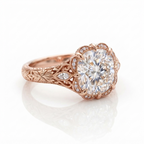 Three-quarter angle view of a rose gold 3 carat cushion cut lab grown diamond vintage engagement ring.