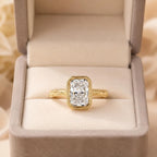 Front view of a 4 carat radiant cut lab grown diamond bezel ring presented inside a luxurious velvet ring box.