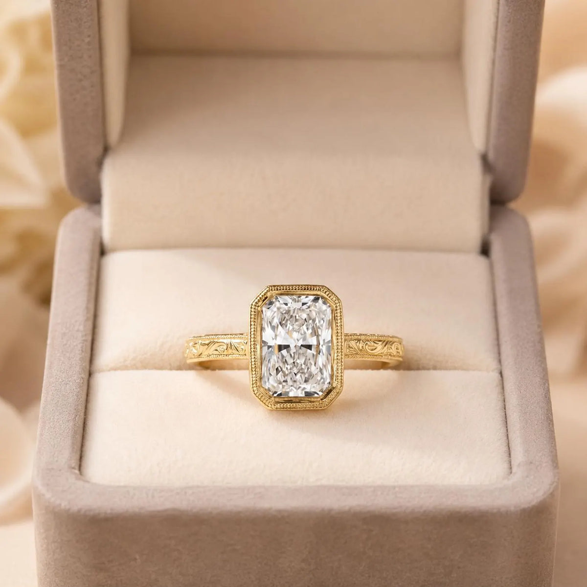 Front view of a 4 carat radiant cut lab grown diamond bezel ring presented inside a luxurious velvet ring box.