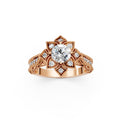 Direct front view of a 3 carat round lab grown diamond engagement ring in 14K rose gold featuring a vintage petal halo with micro-pavé accents.