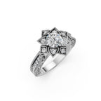 Angled view of a white gold 3 CT round cut lab grown diamond ring with a starburst lotus halo and beaded milgrain texture.