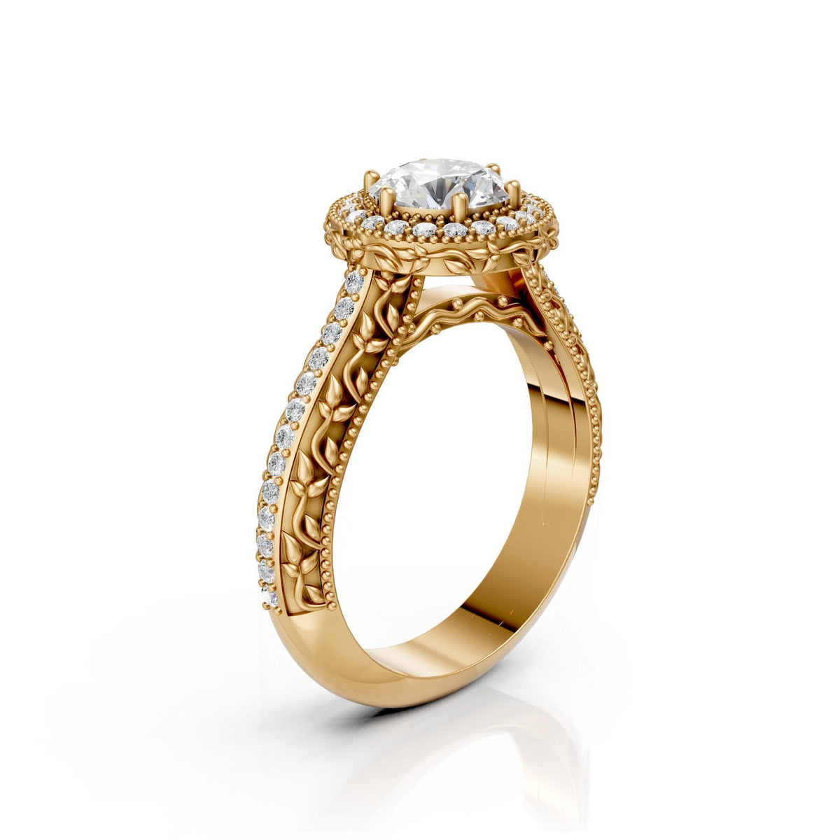 Side profile view of a yellow gold vintage round diamond halo ring displaying intricate leaf scrollwork under-gallery and milgrain edge.