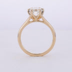 Profile view of a 3 carat oval lab grown diamond cathedral ring in 14K yellow gold.
