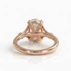 Rear under-gallery view of a 3 CT oval lab grown diamond ring in rose gold showing woven wire basket detail.