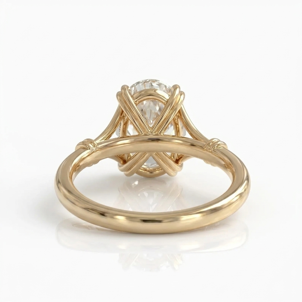 Back under-gallery view of a 3 CT oval cut lab grown diamond ring set in yellow gold.