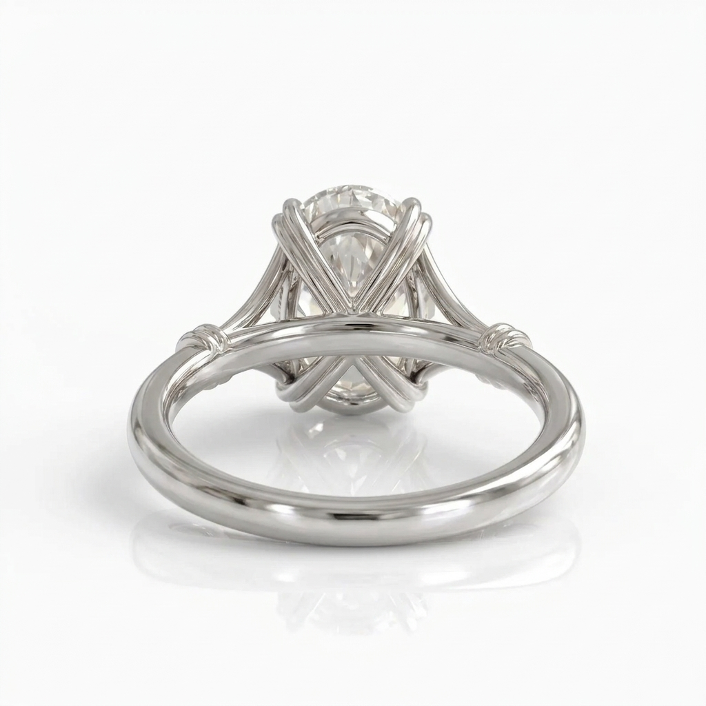 Rear view showing the intricate woven basket setting of a white gold 3 CT oval lab diamond ring.