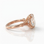 Alternate side profile angle of a 3 carat oval lab grown diamond engagement ring in rose gold.