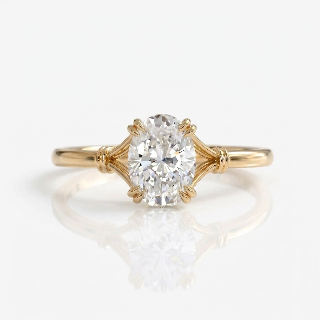 Top-down centered view of a 3 CT oval lab grown diamond engagement ring in yellow gold.