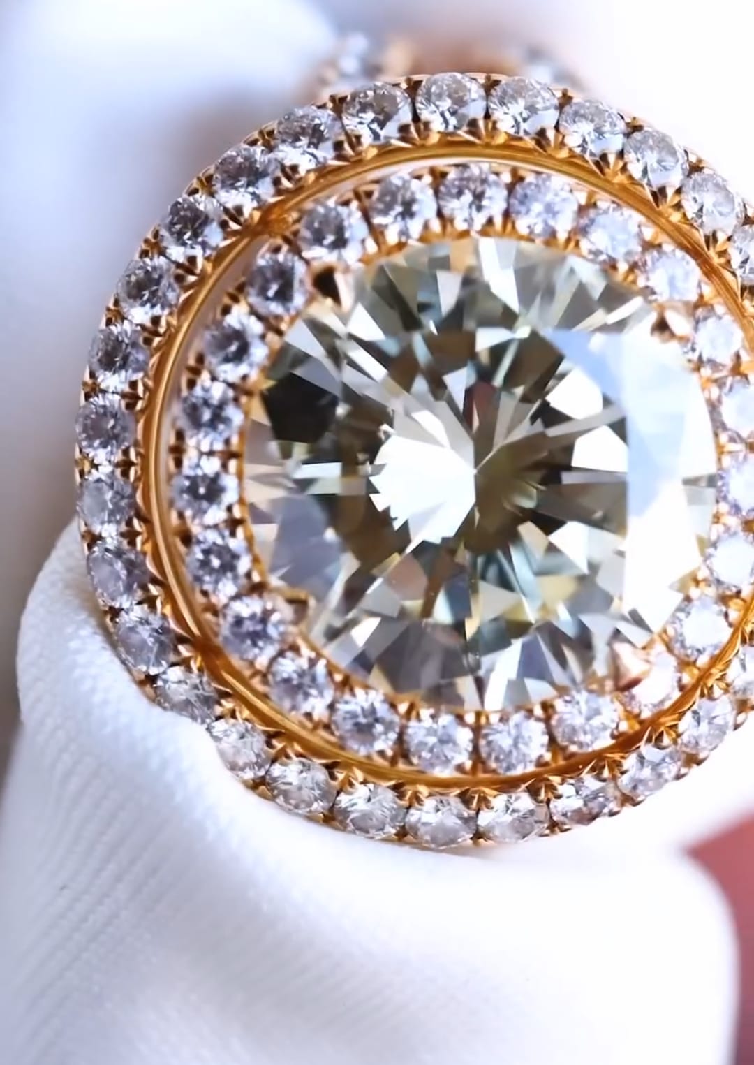 Close-up top view highlighting the brilliance of a 5 CT round cut lab grown diamond inside a double halo.