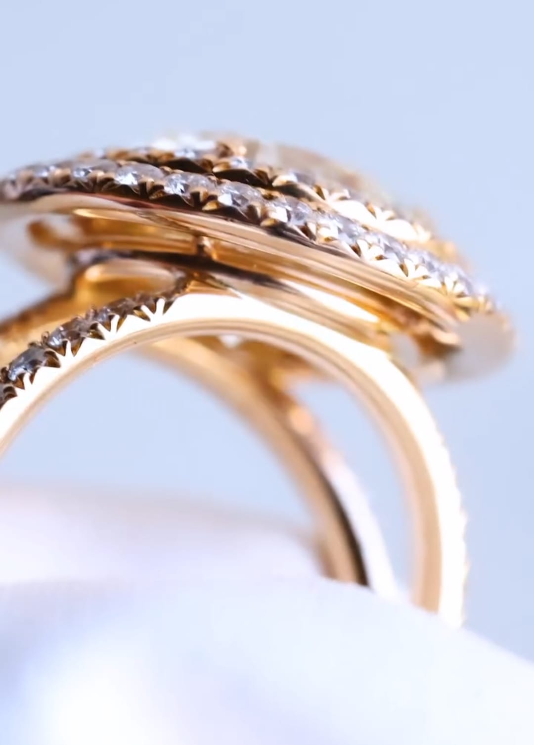 Detail profile view showing the cathedral structure and undergallery of a 5 CT double halo diamond ring.