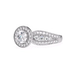 Angle view of a 3 CT round lab grown diamond vintage halo ring with 3-row split shank in white gold.