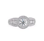 Direct top-down view of a 3 CT round lab grown diamond ring with milgrain halo and wide accent-set band.