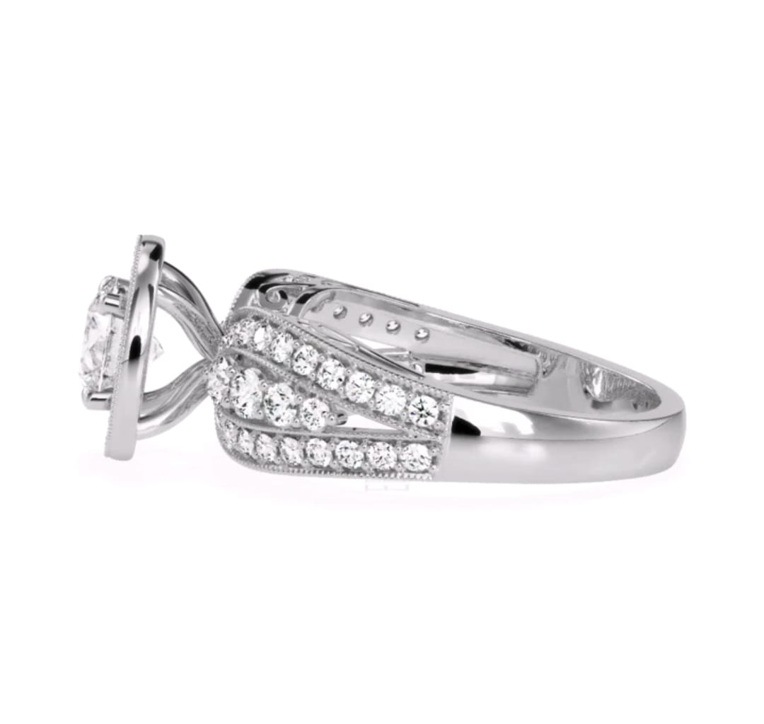 Side perspective of a white gold 3 carat round lab grown diamond halo ring showing cathedral setting and shank.