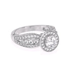 Three-quarter top perspective view of a 3 CT round lab grown diamond engagement ring with vintage milgrain detailing.