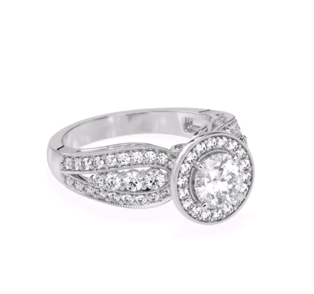 Three-quarter top perspective view of a 3 CT round lab grown diamond engagement ring with vintage milgrain detailing.