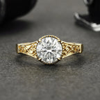 Direct top view of a 3 CT round lab grown diamond with scalloped rim and filigree band shoulders.