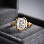 3 CT elongated cushion lab grown diamond ring with split shank band showcased inside a plush gray velvet ring box.