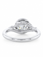 Side profile showing the botanical branch design and bezel setting on a white gold 3 CT round lab diamond ring.