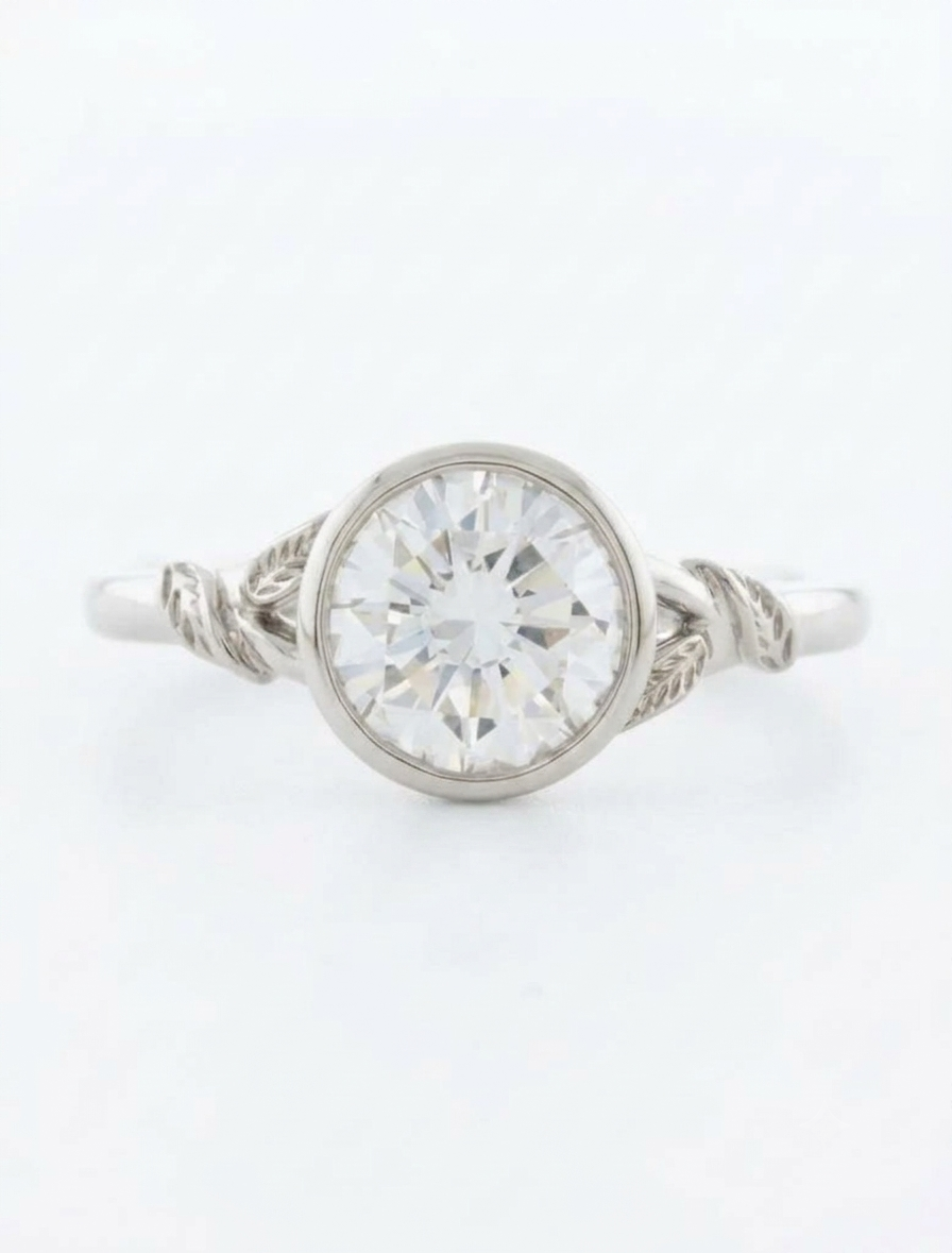 Top view of a 3 CT round brilliant lab grown diamond nature inspired bezel ring in white gold.
