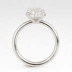 Profile view looking through the band showcasing the hidden halo setting on a 3 CT oval lab diamond ring.