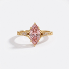 Front top-down view of a 3 CT fancy pink marquise lab diamond engagement ring in 14K yellow gold.