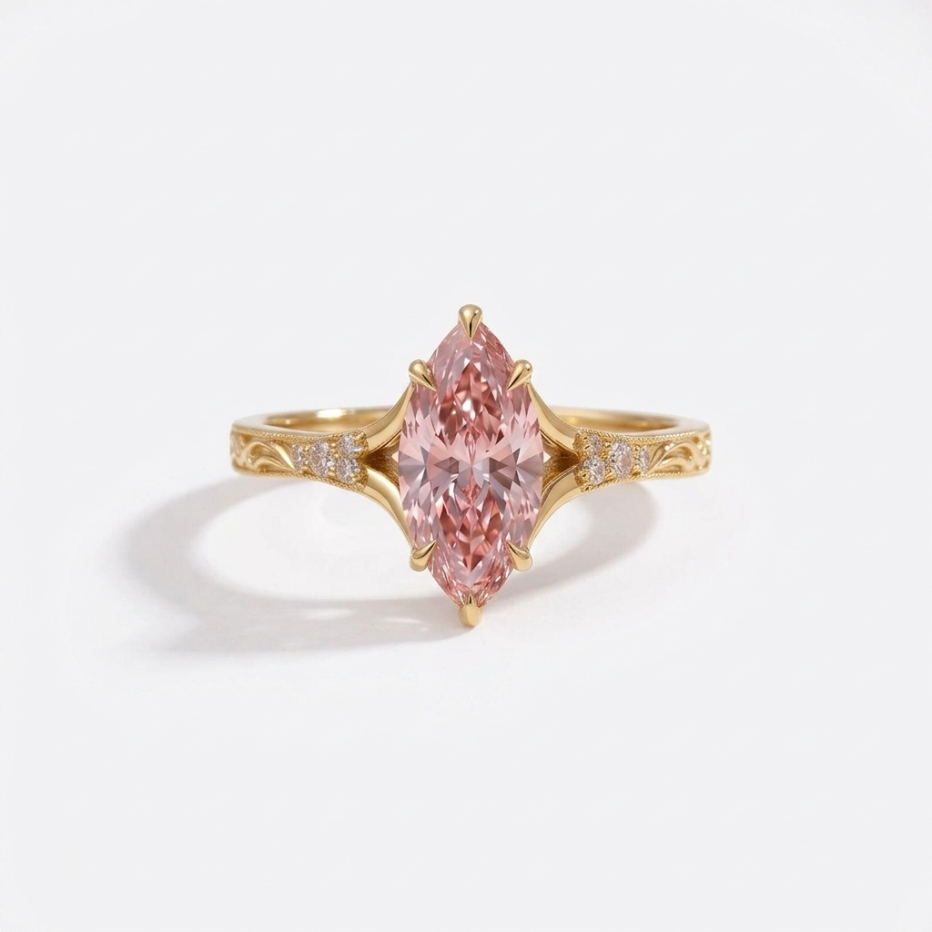 Front top-down view of a 3 CT fancy pink marquise lab diamond engagement ring in 14K yellow gold.