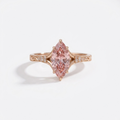 Front perspective of a 3 CT pink marquise cut lab grown diamond solitaire ring in rose gold.