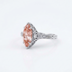 Side angle view of a 3 CT pink marquise cut lab diamond ring set in 14K white gold.