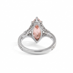 Looking through the band at the undergallery setting of a 3 CT pink marquise lab diamond ring in white gold.