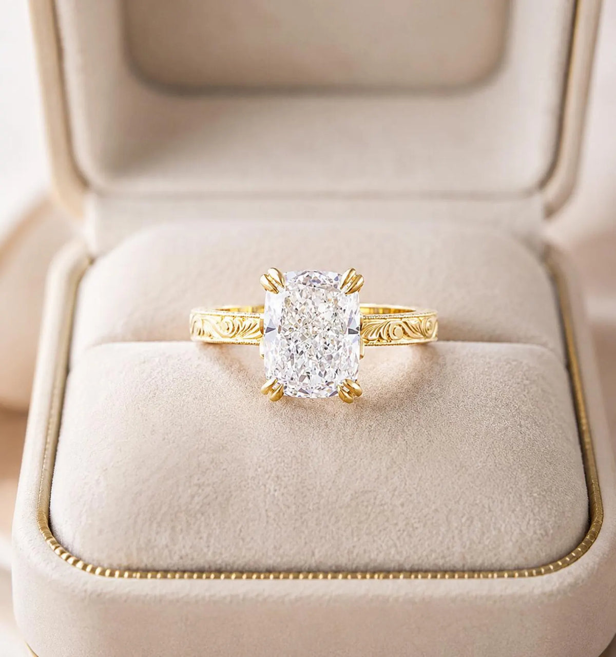 3 CT cushion cut lab grown diamond vintage solitaire ring presented in a beige velvet ring box.