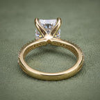 Rear view displaying the basket support structure and smooth bottom band of a lab grown diamond ring.