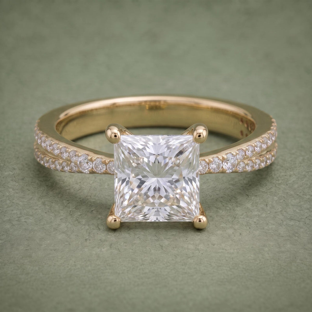 Direct front top view showing a 2 CT princess cut lab diamond centered on a double pavé yellow gold band.