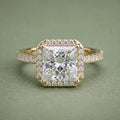Direct top view showing a 4 carat princess cut lab diamond surrounded by a brilliant halo setting on a pavé band.
