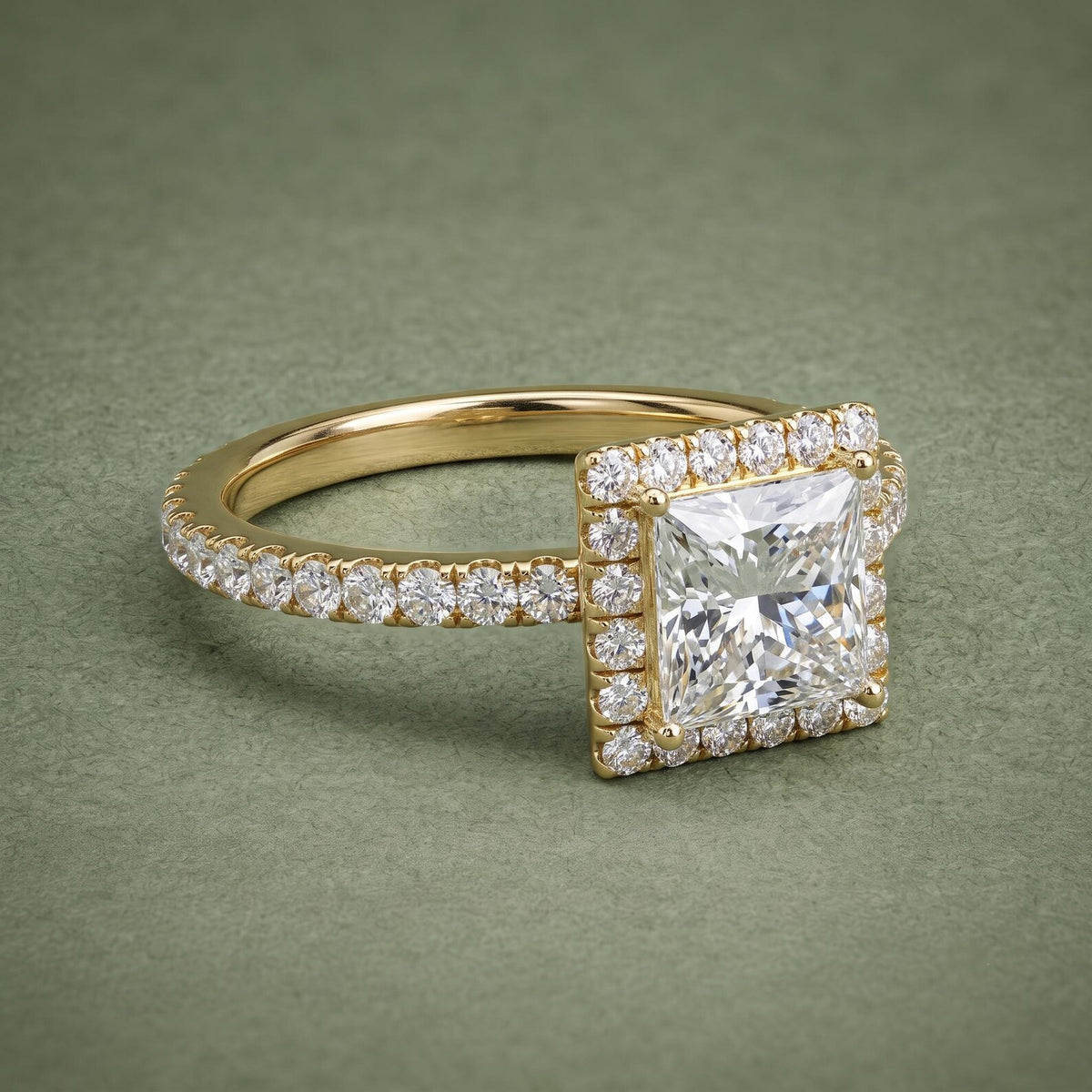 Elevated view showcasing the brilliant square halo and continuous diamond pavé band.