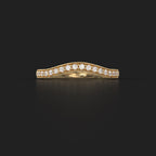 Standalone curved chevron micro-pavé diamond wedding band in 14K yellow gold.
