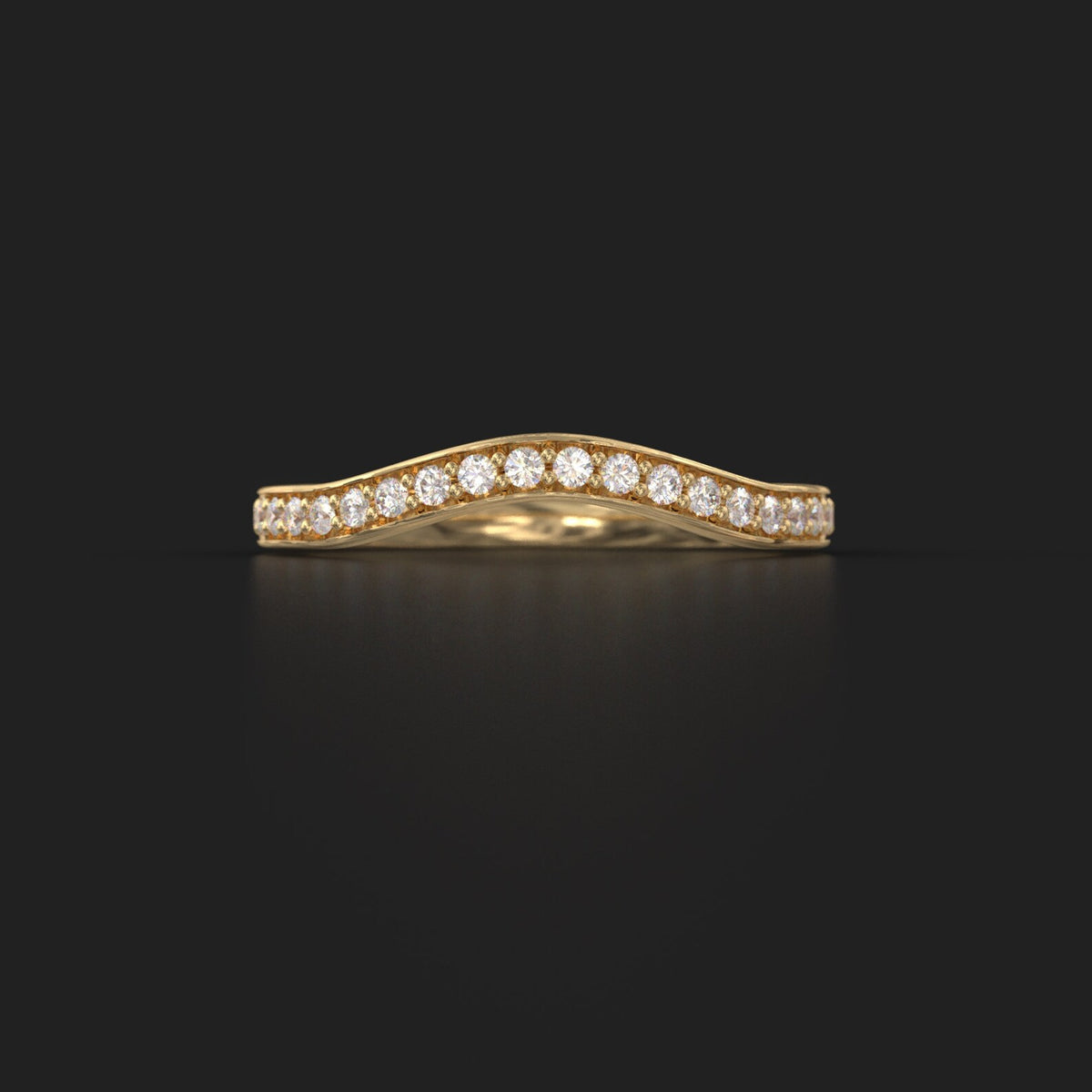 Standalone curved chevron micro-pavé diamond wedding band in 14K yellow gold.