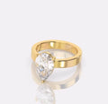 Direct view looking through the yellow gold ring band showcasing the open gallery architecture supporting the 2 CT pear lab diamond center stone.