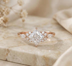 Rose gold 3 CT compass-set princess cut lab grown diamond ring with cluster side stones