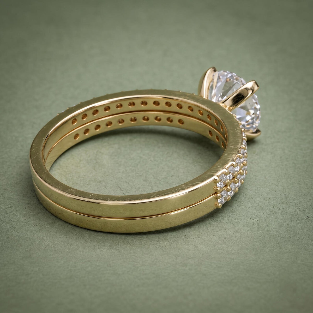 Rear view showing smooth polished yellow gold bands on 3 CT round lab diamond bridal set.