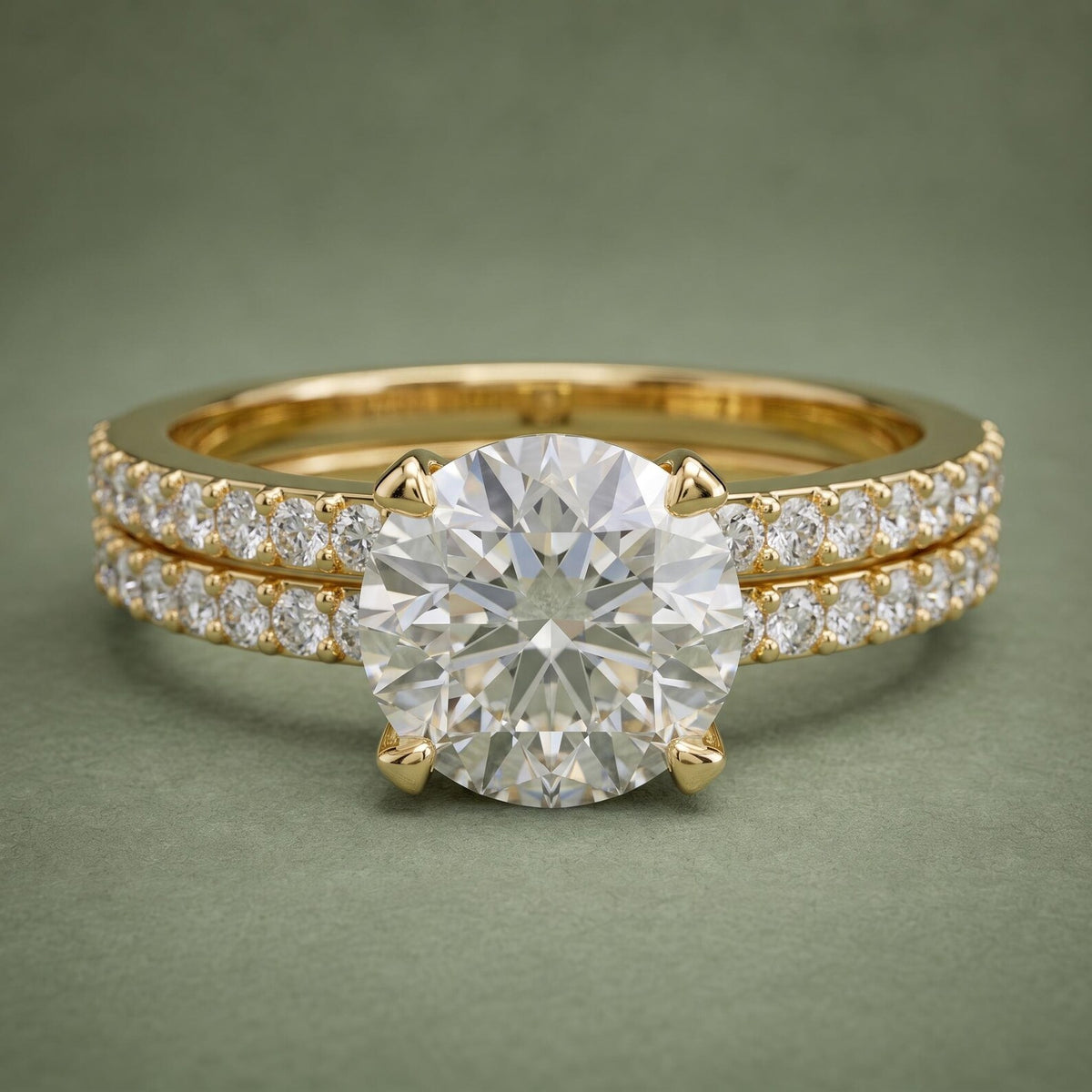 Direct top view of 3 CT round brilliant cut lab grown diamond solitaire paired with matching pavé band.