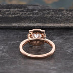 Underside view showing the intricate open gallery structure and polished rose gold shank of the 2 CT ring.