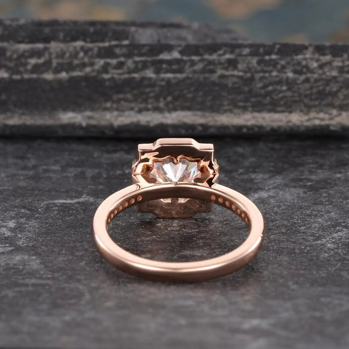 Underside view showing the intricate open gallery structure and polished rose gold shank of the 2 CT ring.