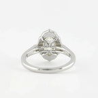 Underside gallery view of a white gold 3 CT oval lab diamond ring featuring delicate bridge architecture.