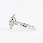 Profile side view highlighting milgrain shoulder accents on a 3 CT oval lab diamond ring.