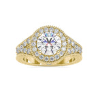 Direct top view of a 3 CT round cut lab grown diamond halo engagement ring crafted in yellow gold.